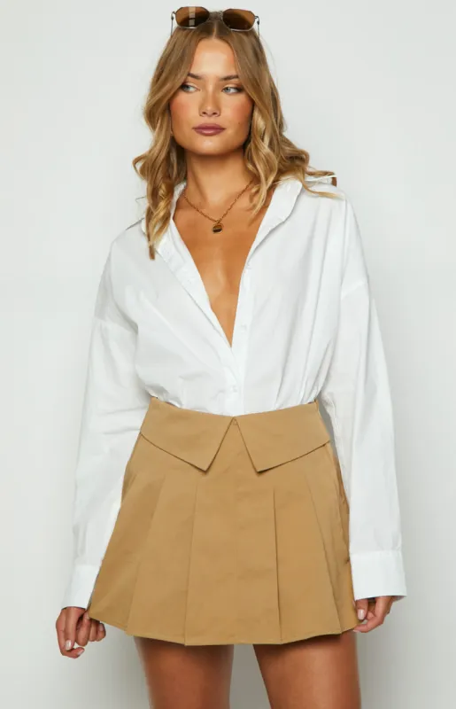Haylen Tan Pleated Mini Skirt sold by Beginning Boutique