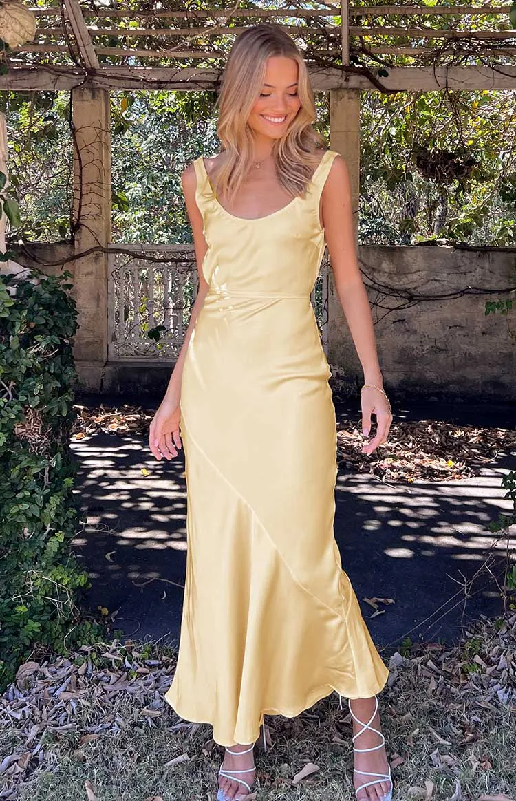 Carnation Yellow Satin Maxi Dress sold by Beginning Boutique