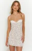 Trouble Floral Mini Dress sold by Beginning Boutique