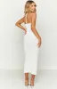 Lotus White Knit Maxi Dress sold by Beginning Boutique