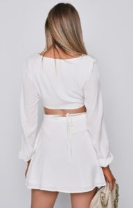 Jupiter White Mini Dress sold by Beginning Boutique
