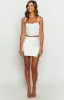 Vivian White Lace Mini Skirt sold by Beginning Boutique
