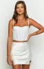Vivian White Lace Mini Skirt sold by Beginning Boutique