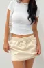 Maven Sand Mini Skirt sold by Beginning Boutique