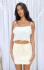 Maven Sand Mini Skirt sold by Beginning Boutique
