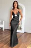 Rosebud Black Maxi Dress sold by Beginning Boutique