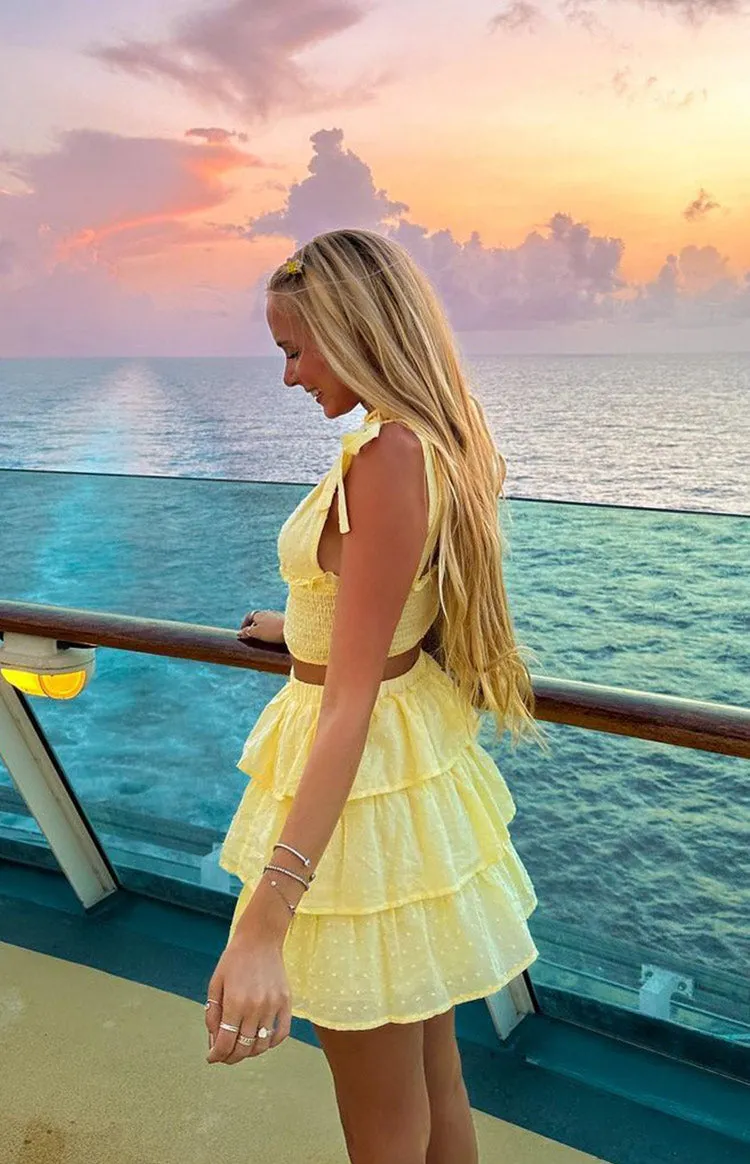 Madelyn Yellow Mini Skirt sold by Beginning Boutique