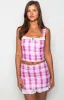 Till Forever Pink Check Mini Skirt sold by Beginning Boutique