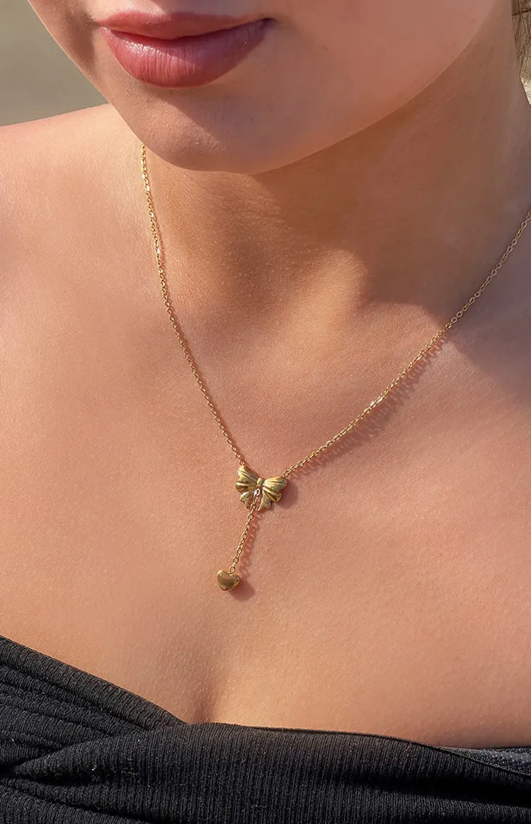 Vincent Gold Bow Necklace sold by Beginning Boutique