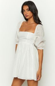 Rubi White Babydoll Mini Dress sold by Beginning Boutique