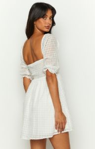 Rubi White Babydoll Mini Dress sold by Beginning Boutique