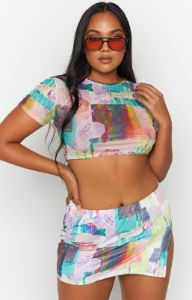 Ruel Multi Print Mesh Mini Skirt sold by Beginning Boutique