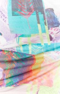 Ruel Multi Print Mesh Mini Skirt sold by Beginning Boutique