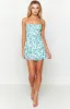 Isabel White Floral Mini Dress sold by Beginning Boutique