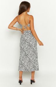 Delphine Black Floral Midi Dress sold by Beginning Boutique
