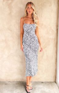 Delphine Black Floral Midi Dress sold by Beginning Boutique