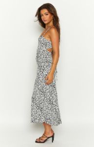 Delphine Black Floral Midi Dress sold by Beginning Boutique