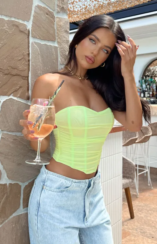 The Electric Green Mesh Strapless Corset sold by Beginning Boutique