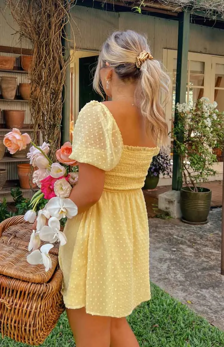 Noel Yellow Mini Dress sold by Beginning Boutique