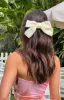 Penelope Cream Bow Hair Clip sold by Beginning Boutique