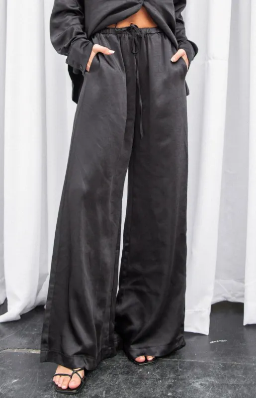 Livia Black Satin Pants sold by Beginning Boutique