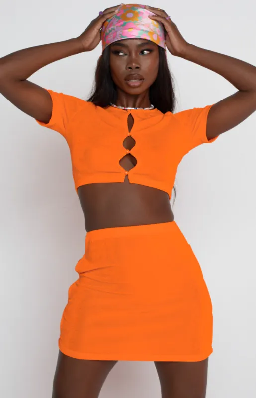 Moscow Mini Skirt Orange sold by Beginning Boutique