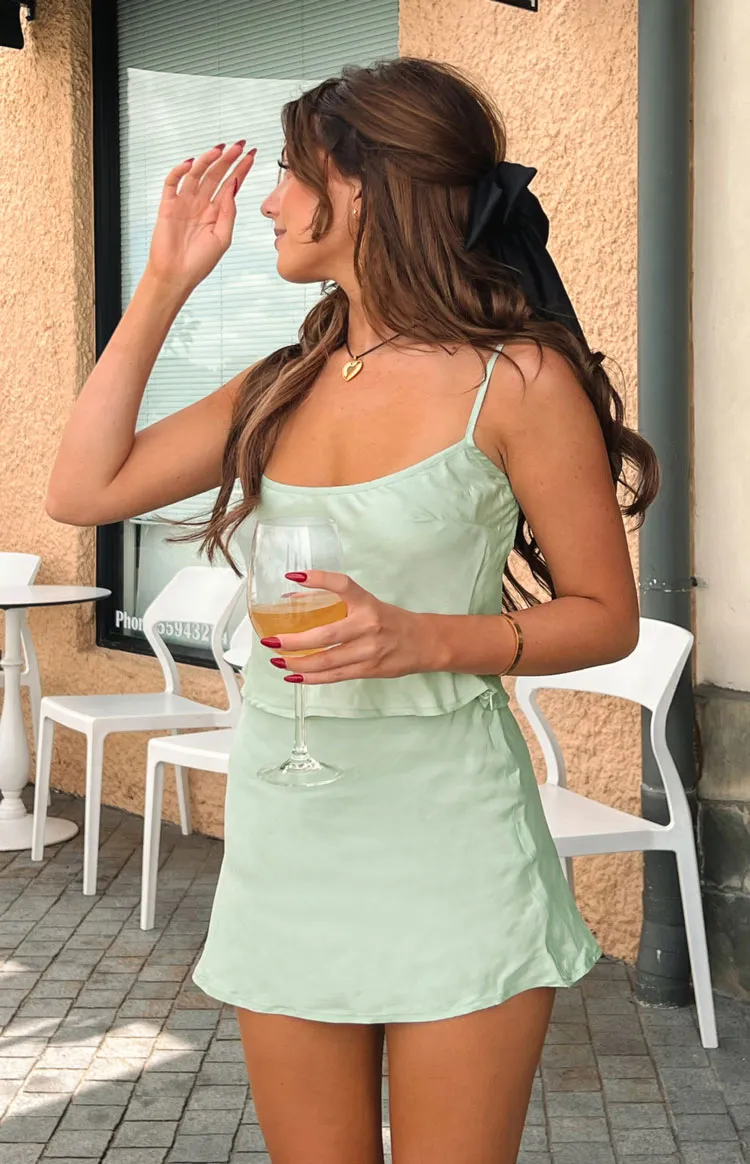 Milliana Sage Mini Skirt sold by Beginning Boutique