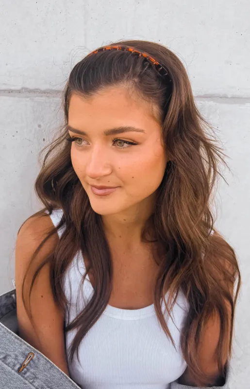 The Holly Brown Headband sold by Beginning Boutique