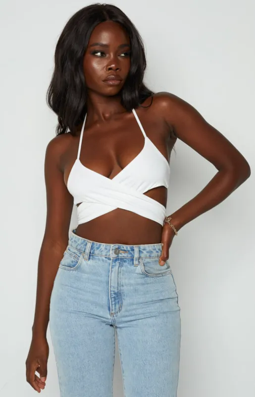 Emalia White Wrap Top sold by Beginning Boutique