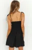 Tisha Black Mini Dress sold by Beginning Boutique