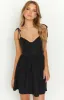 Tisha Black Mini Dress sold by Beginning Boutique