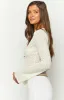 Blossom Breeze White Knit Long Sleeve Top sold by Beginning Boutique