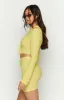 Lizzy Lemon Waffle Mini Skirt sold by Beginning Boutique