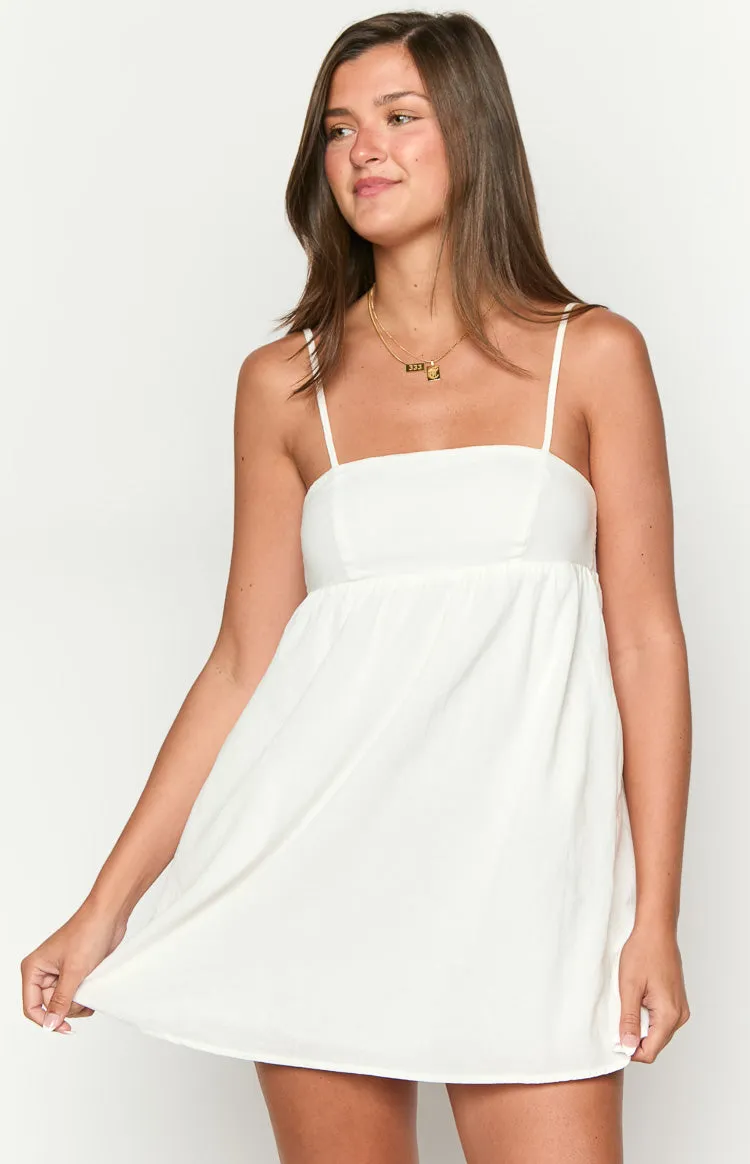 Lotus Love Affair White Mini Dress sold by Beginning Boutique