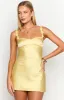 Marbelle Yellow Satin Mini Dress sold by Beginning Boutique