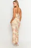 Sintra Yellow Bloom Maxi Dress sold by Beginning Boutique