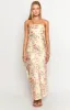 Maiah Yellow Bloom Maxi Dress sold by Beginning Boutique