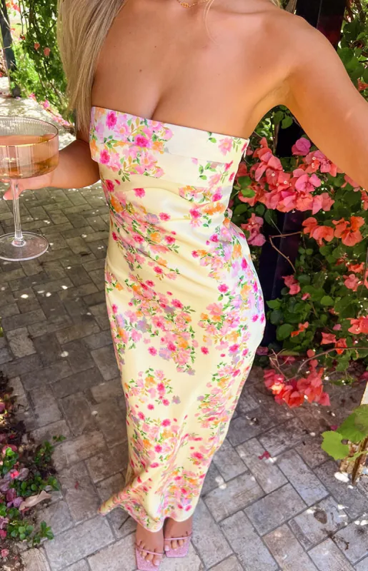 Maiah Yellow Bloom Maxi Dress sold by Beginning Boutique