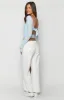 Clara Star White Denim Low Rise Jeans sold by Beginning Boutique
