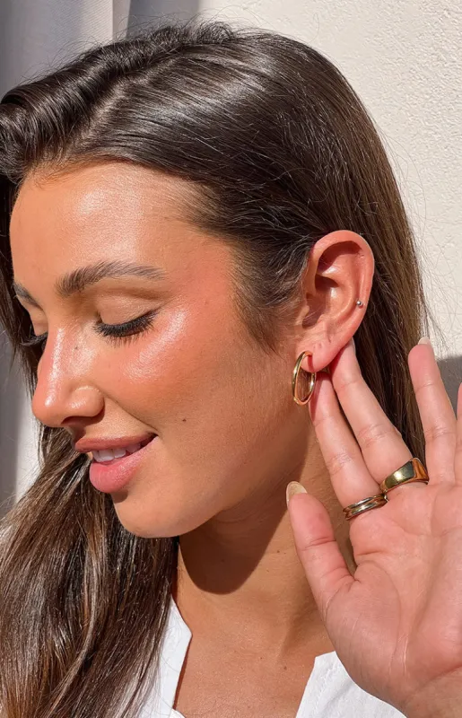 Danza Gold Hoop Earrings sold by Beginning Boutique