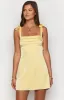 Akira Yellow Tie Mini Dress sold by Beginning Boutique