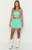 Stay Teal Lace Mini Skirt sold by Beginning Boutique