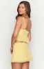 Zyra Yellow Mini Skirt sold by Beginning Boutique