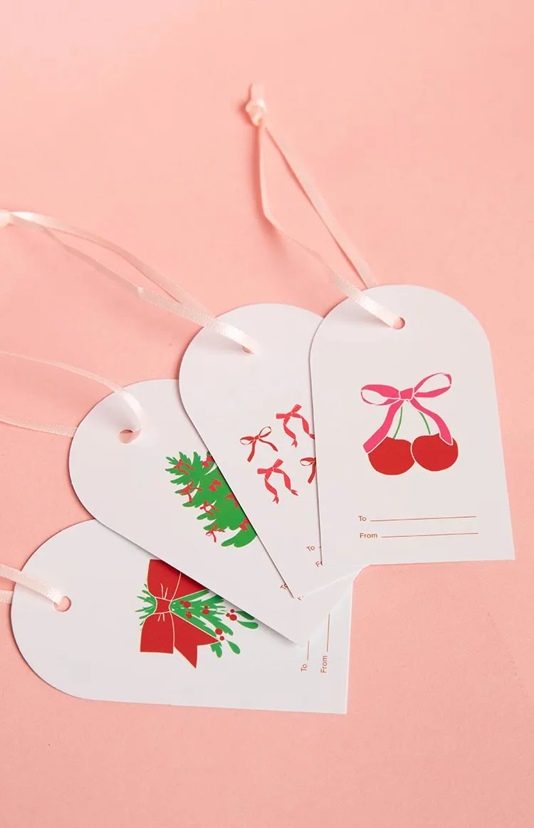 Christmas Tags 16 Pack sold by Beginning Boutique