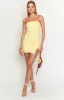 Let Go Yellow Ruched Mini Dress sold by Beginning Boutique