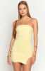 Let Go Yellow Ruched Mini Dress sold by Beginning Boutique