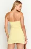 Let Go Yellow Ruched Mini Dress sold by Beginning Boutique