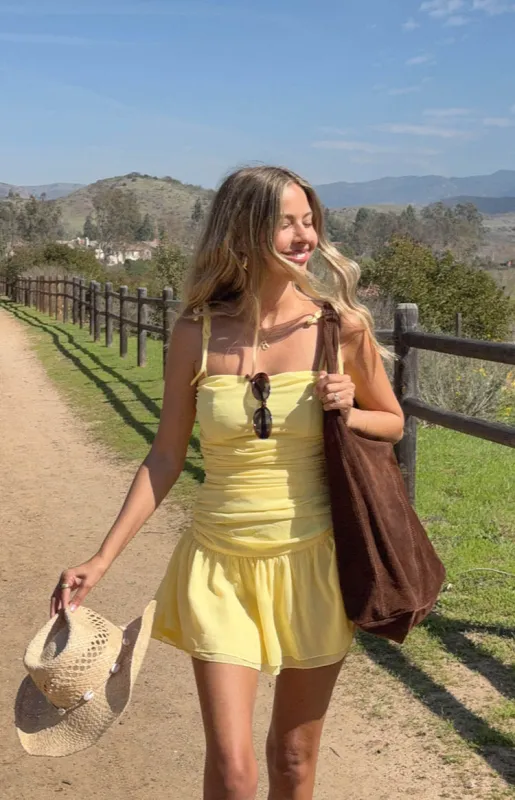 Milly Yellow Mini Dress sold by Beginning Boutique