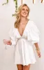 Torie White Short Sleeve Mini Dress sold by Beginning Boutique