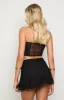 Stay Black Mesh Mini Skirt sold by Beginning Boutique